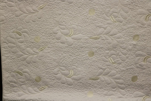 Kathleen White with Cream Quilt Set