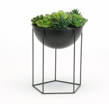 black bowl sitting inside black stand