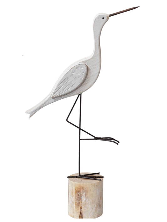 Large Wooden Storks on Stump